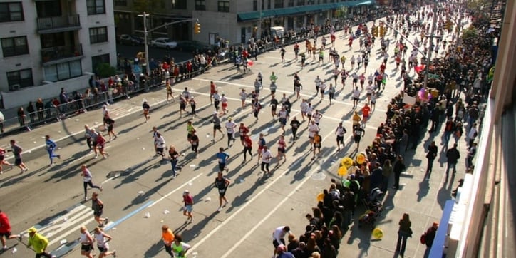 Large group of runners during road race