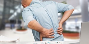 Man-with-back-pain-spinal-lesion