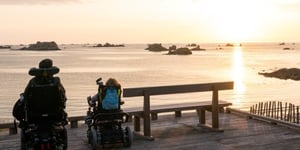 Adult-and-child-in-wheelchairs-on-porch