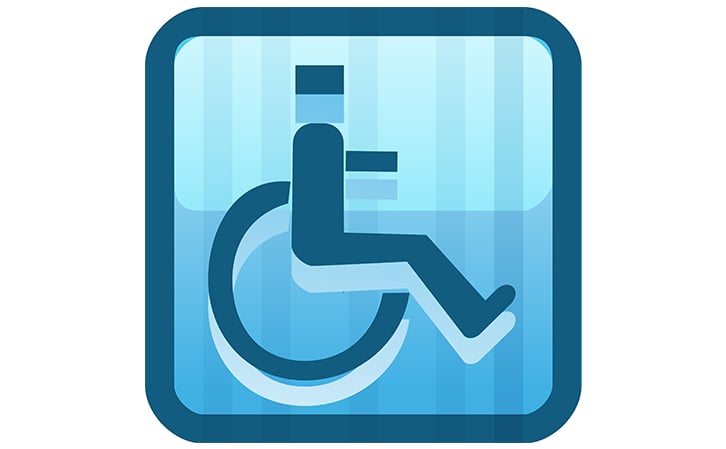 Boarding handicapped person in a wheelchair