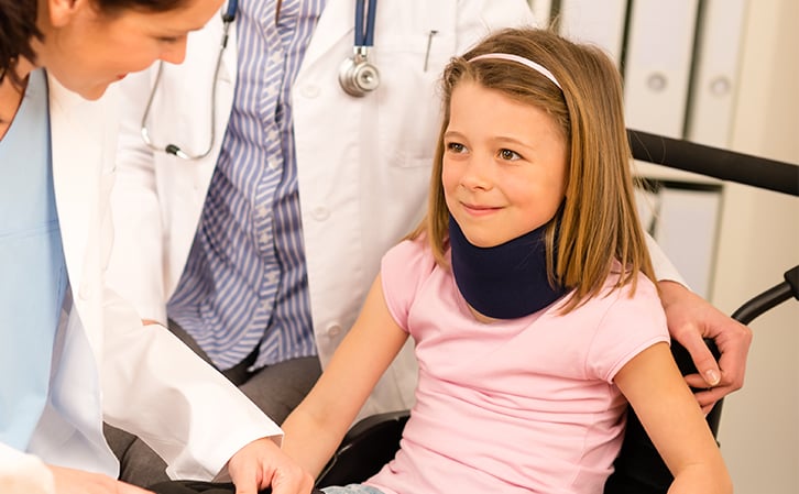 kid with spinal cord injury or brain injury smiling