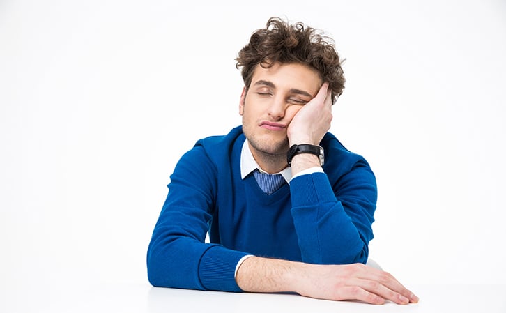 man finding it hard to sleep